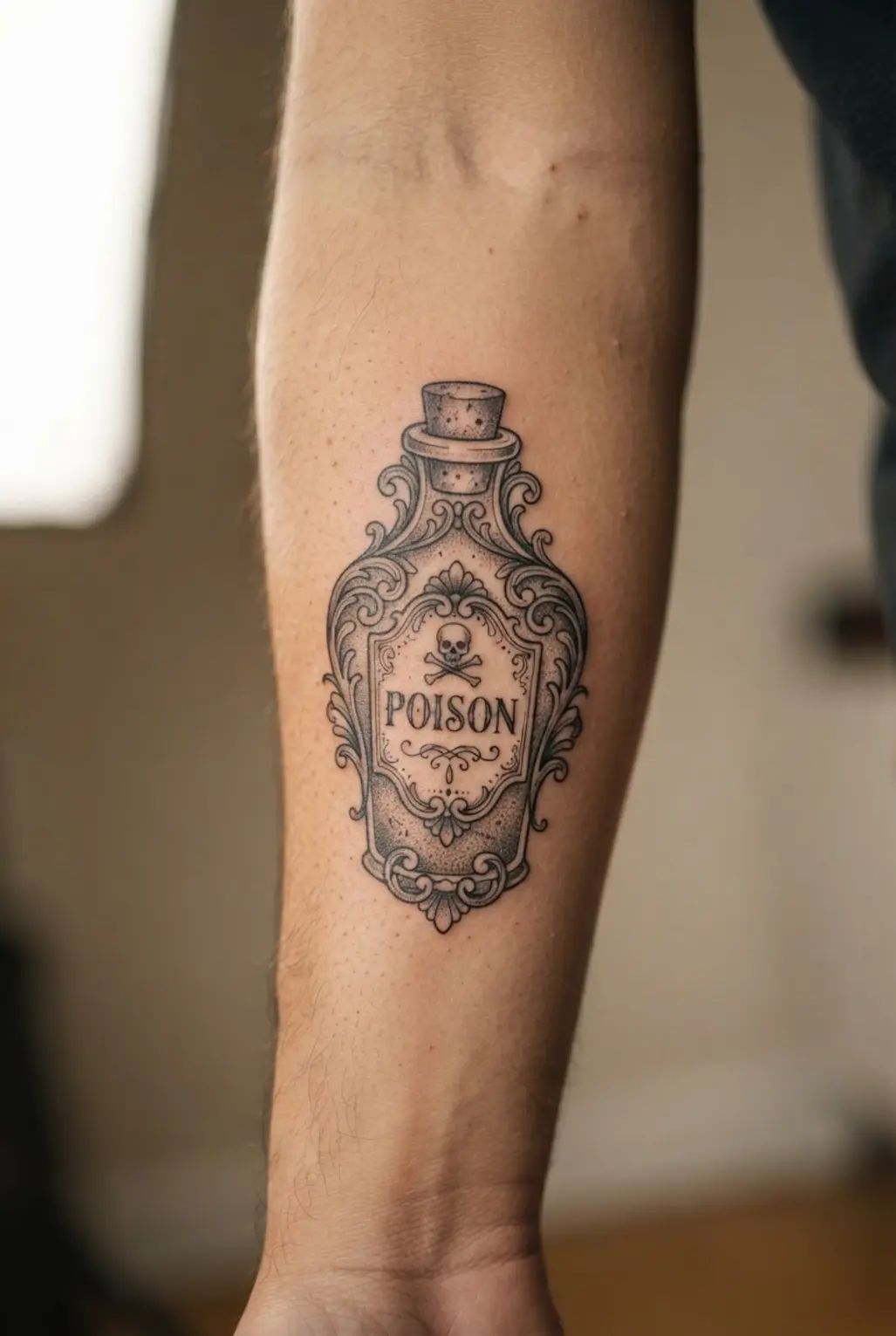 Victorian tattoo ideas showing an ornate apothecary poison bottle with a serif label, filigree, and gray shading.