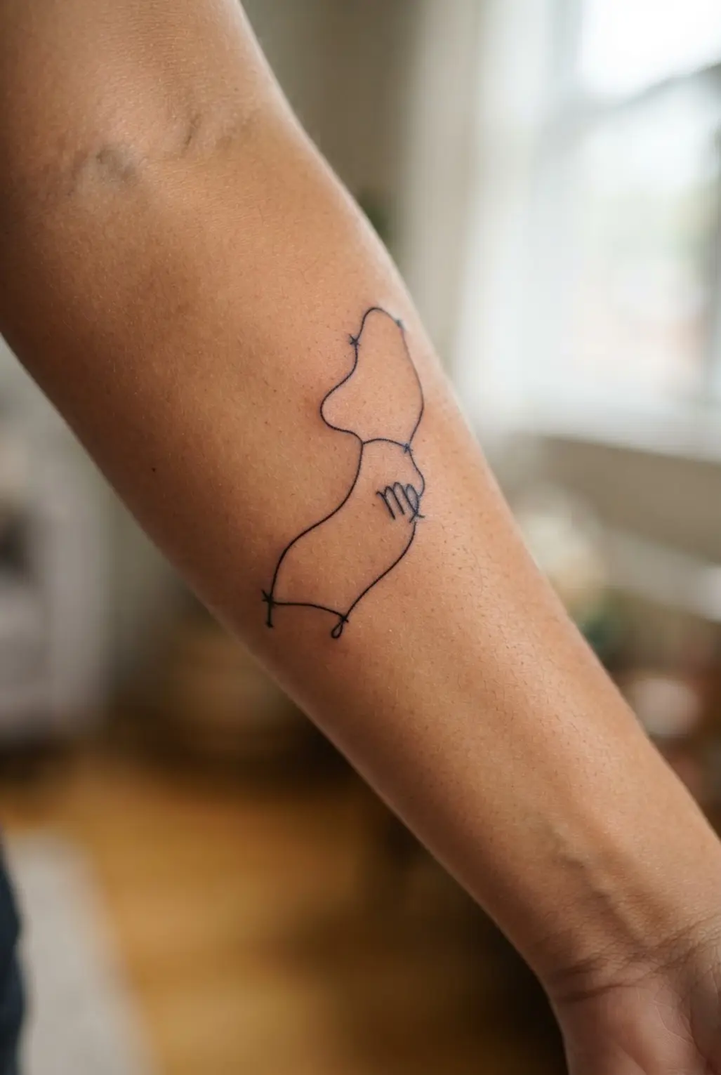 A minimalist and elegant single-line tattoo depicting the complete Virgo star pattern.